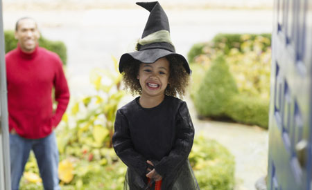 African girl in Halloween costume